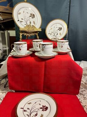 Elegant White Porcelain Tea Cup and Saucer Set with Gold Trim - Floral Design